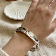 Silver Ribbon Twist Kada.