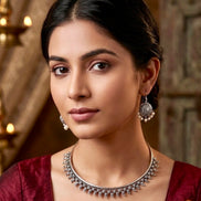 Pearl-Kissed Moon Hasli & Jhumka Set.
