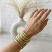 Cleopatra Coil GOLDENSILVER BRACELET