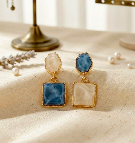 Mismatched Geometric Resin Drop Earrings.