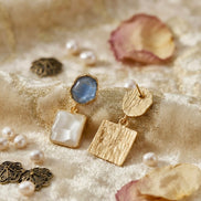 Mismatched Geometric Resin Drop Earrings.