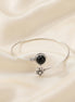 Silver-toned black stone bracelet