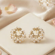 Stone-Studded Pearl Circular Studs Earrings.