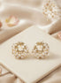 Stone-Studded Pearl Circular Studs Earrings.