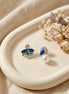 Mismatched Flower and Bud Earrings.